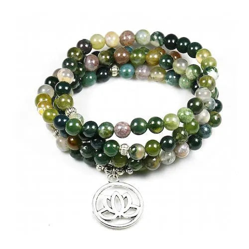 Handcrafted natural stone bracelet with alloy volcano white turquoise charm in a simple design.