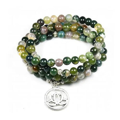 Handcrafted natural stone bracelet with alloy volcano white turquoise charm in a simple design.