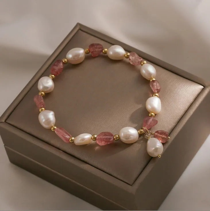 Handcrafted strawberry quartz crystal bracelet with adjustable string closure and Hetian jade peach blossom design
