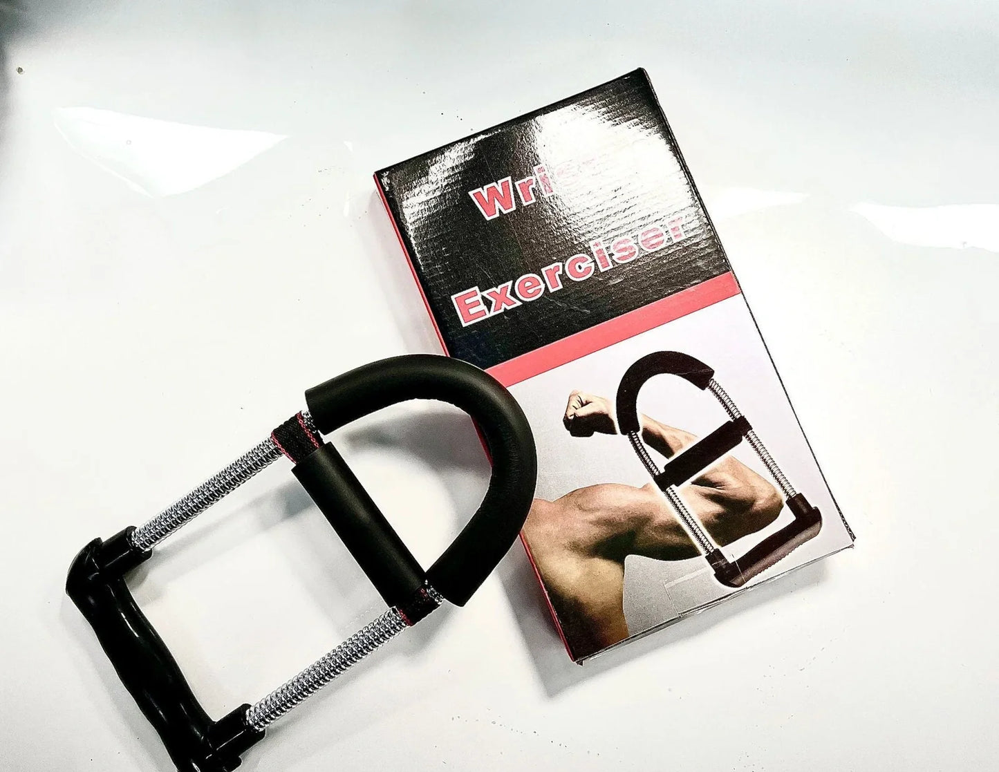 Wrist strength device with 45LB spring steel resistance and black finish for grip training