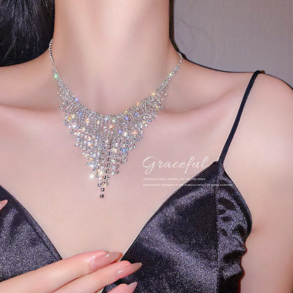 Silver tone tassel necklace with geometric alloy pendant and ball bead chain, 21-50cm circumference