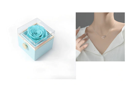 Acrylic rotating rose jewelry box in sapphire blue, 10cm diameter with three-layer storage and carrying bag