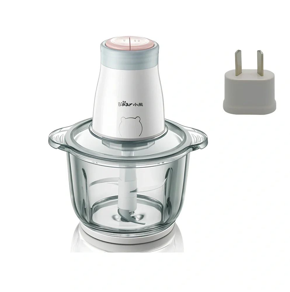 Household electric vegetable chopper blender with glass bowl and stainless steel blade on kitchen counter