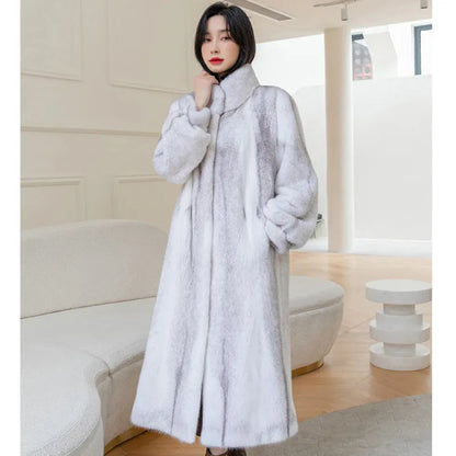 White women's faux fur coat with a stand-up collar, shown on a model.