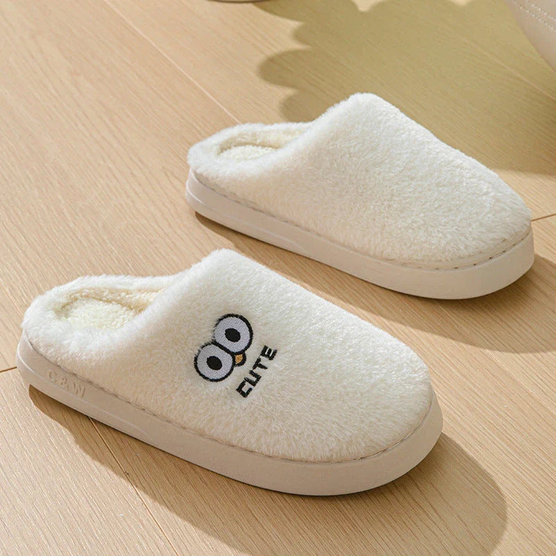 Cozy cartoon slippers with big eyes, available in various colors and sizes for couples to enjoy at home