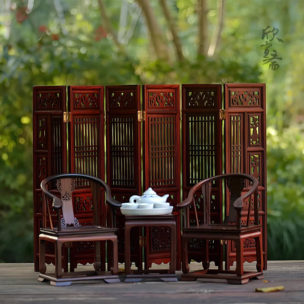 Red rosewood miniature Chinese furniture model with traditional carved details and mahogany construction