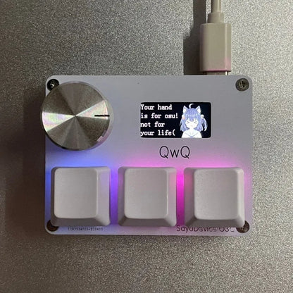 Magnetic axis numeric game keypad with programmable knob and colour screen on desk