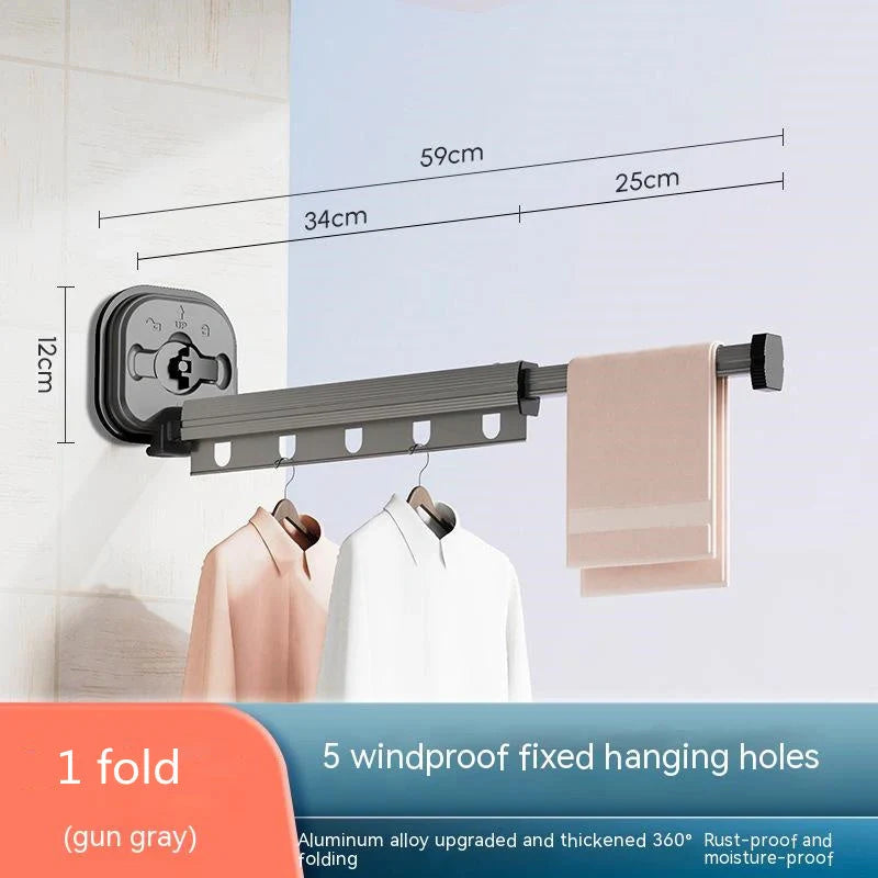 Aluminum retractable drying rack mounted on a window, extending outward for clothes drying