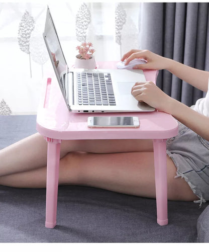 Foldable bed table in Nordic colors for portable computing