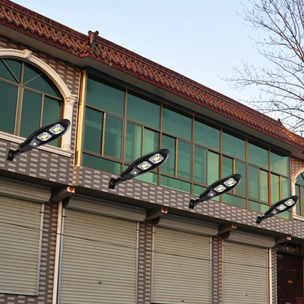 Solar street LED light with 55cm housing, white illumination, and remote control for outdoor garden security