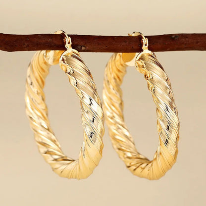 Geometric drop-shaped ear clip earrings with electroplated finish in various colours