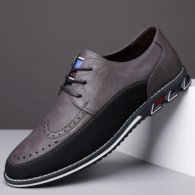 Men's black leather casual shoes with a leather toe cap and rubber sole on a white background.
