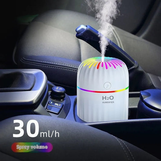 Mini USB aromatherapy humidifier in green, pink or white with 75x75x116mm dimensions and 0.5L water tank