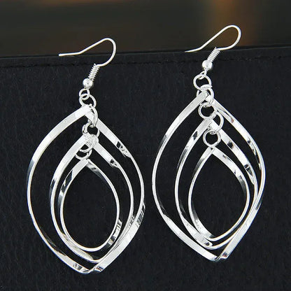 Korean style hollowed-out women's earrings in geometric alloy with electroplated finish, round circle colour, one pair