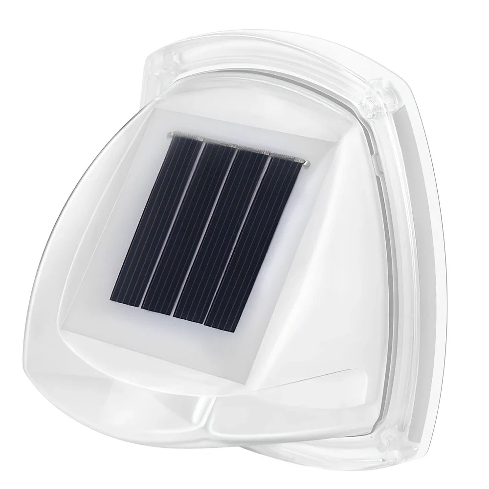 Solar garden wall lamp with waterproof housing mounted on brick wall