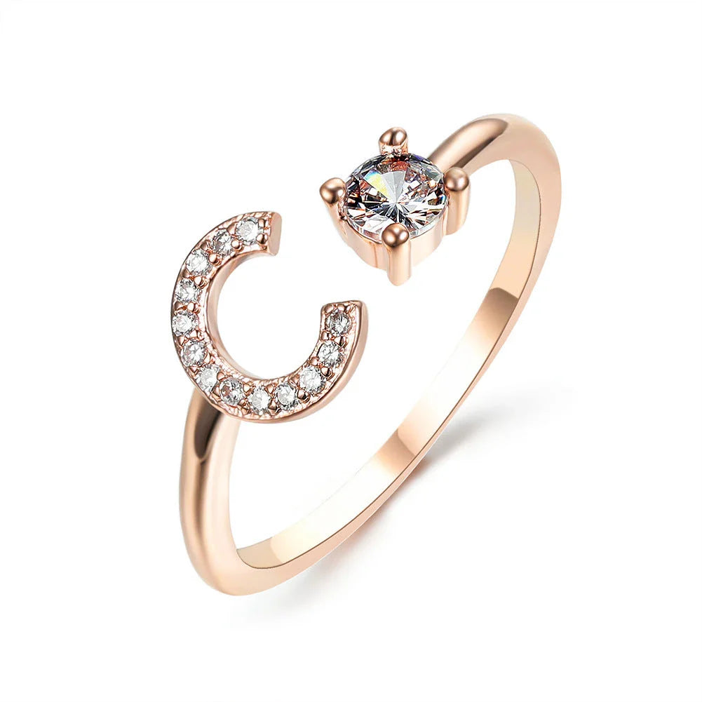 Personalized Initial Letter Adjustable Ring made of copper alloy and zircon, showcasing a vintage-inspired design