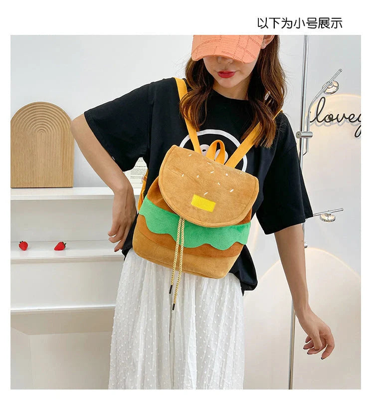 Hamburger-shaped plush backpack with adjustable drawstring and fastening buckle