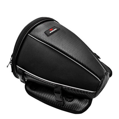 Black waterproof motorcycle tail bag with reflective stripe, showing multiple pockets and a carrying strap.