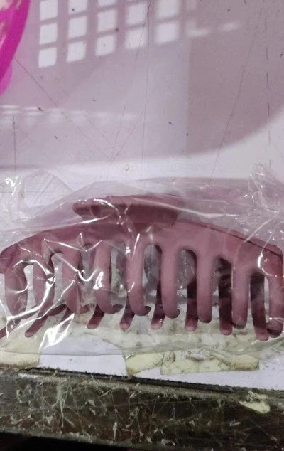 Candy-colored ponytail clip hair accessory in various vibrant colors, perfect for showers and styling