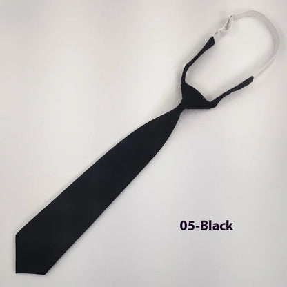 Men's navy blue cotton bow tie with arrow style shape on a white background.