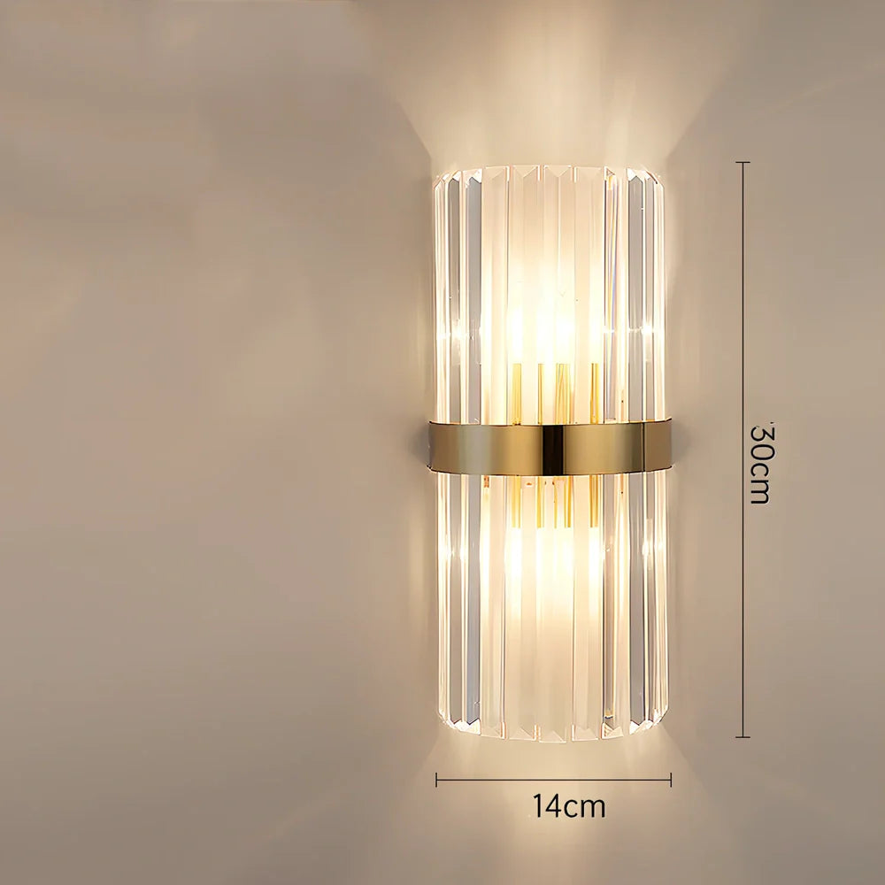 Crystal bedside lamp with stainless steel base and transparent shade providing soft illumination