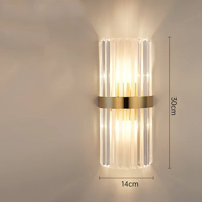 Crystal bedside lamp with stainless steel base and transparent shade providing soft illumination