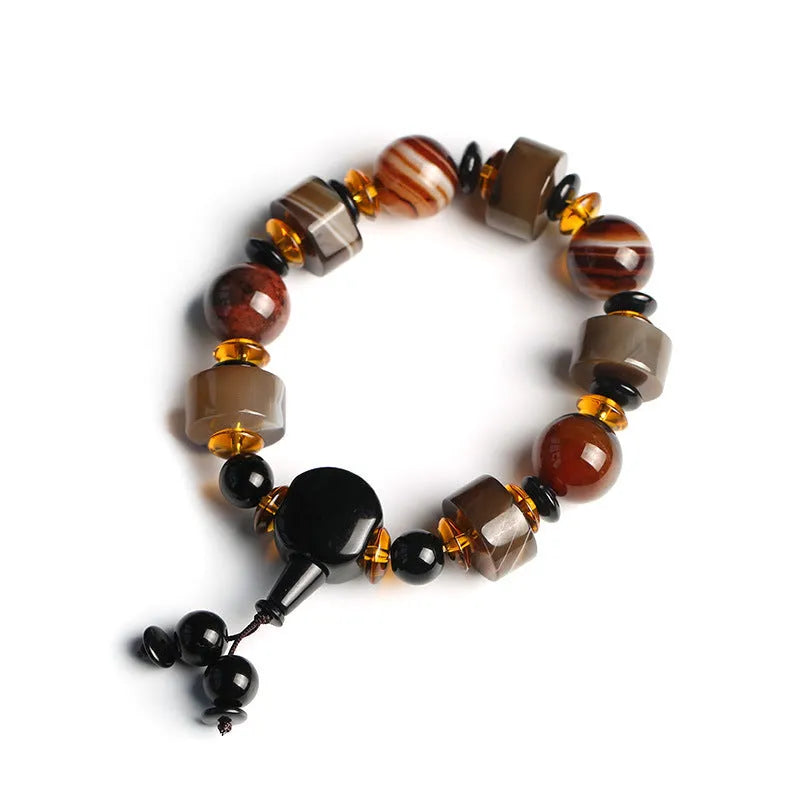 Natural agate ethnic bracelet with geometric design featuring multiple agate bead types and sizes
