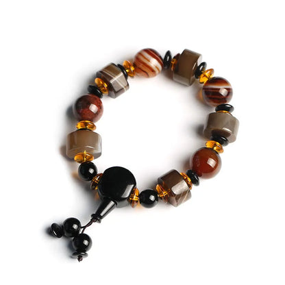 Natural agate ethnic bracelet with geometric design featuring multiple agate bead types and sizes