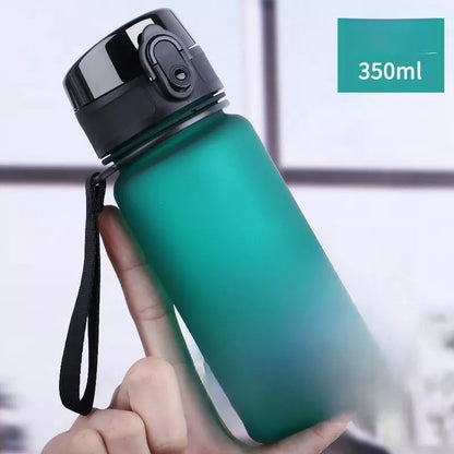 Large capacity Tritan sports water bottle in vibrant colors, perfect for hydration on the go