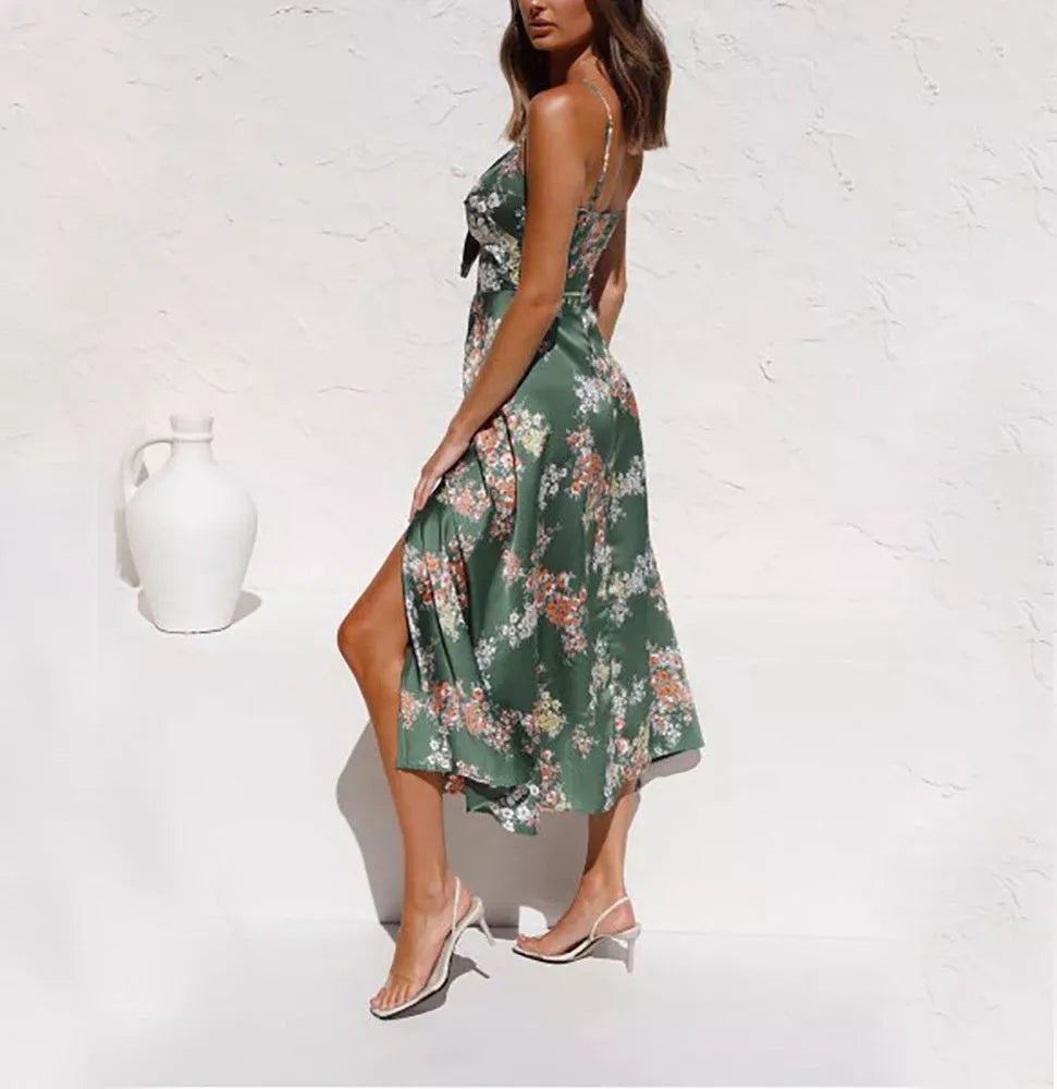 Women's sleeveless beach dress with flower print and hollow bowknot design