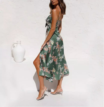 Women's sleeveless beach dress with flower print and hollow bowknot design