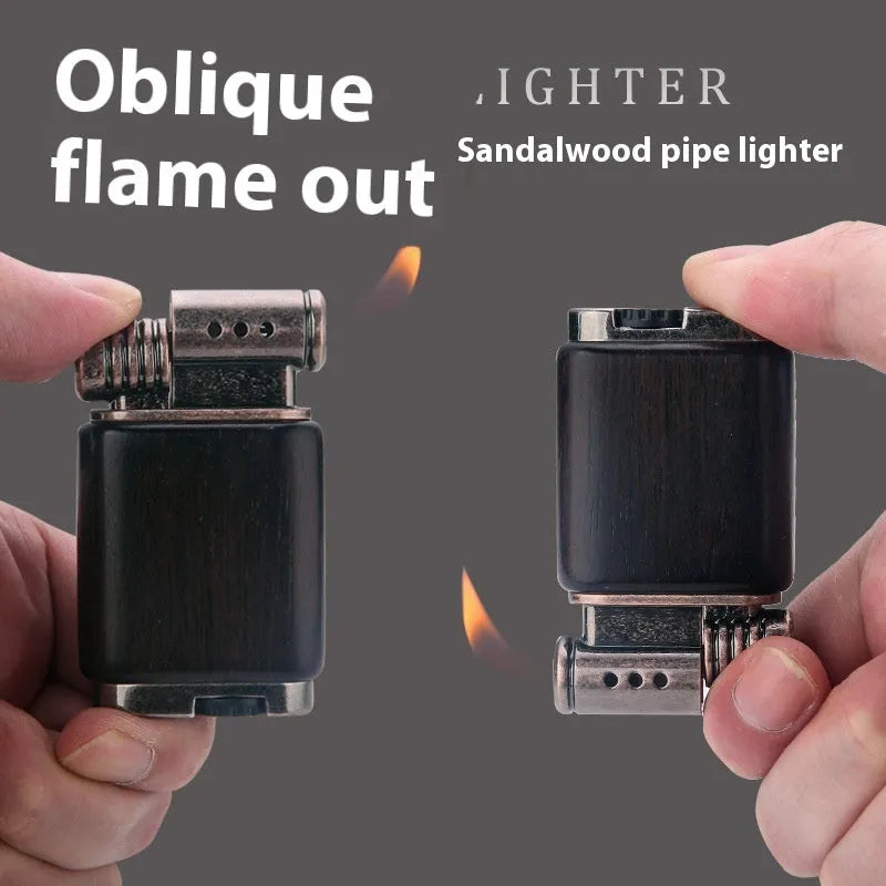 Ebony gas lighter with decorative rosewood and red wood carved panels