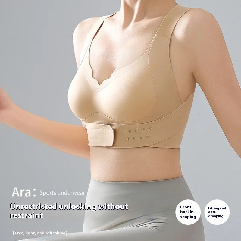 Women's front buckle yoga bra in black, showing back shaping design and fixed double straps.