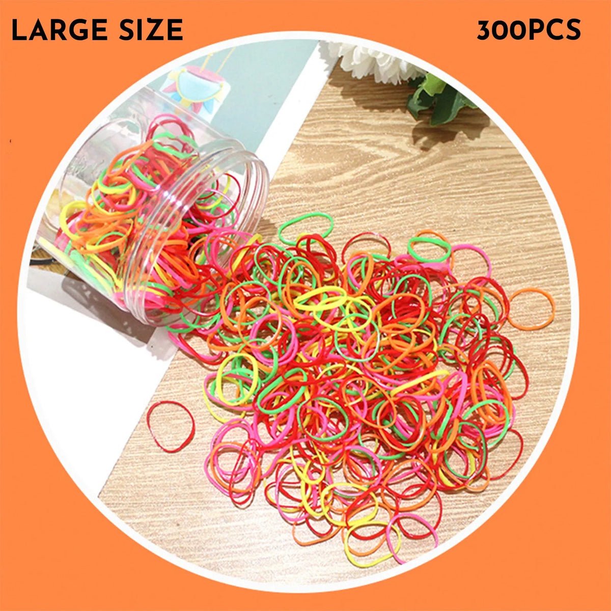 Multicoloured assortment of thin TPU elastic hair bands for babies and children in a reusable plastic container.