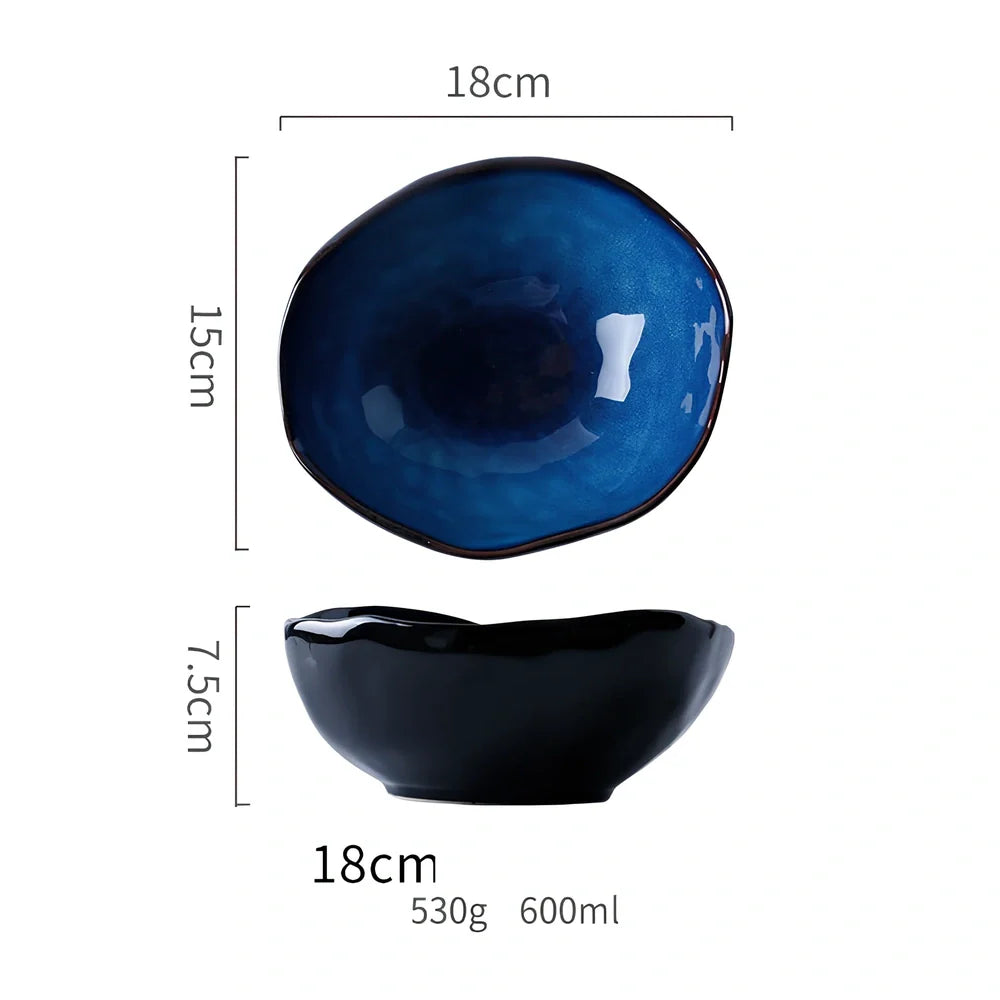 Blue irregular ceramic plate with kiln-changing glaze pattern, measuring approximately 20cm across irregular edges