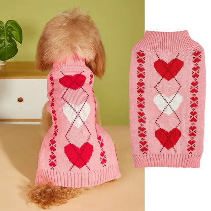 Red love heart pattern dog sweater with pink bow decoration on small dog