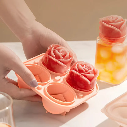 Orange silicone ice mould with 2.5-inch rose shapes and built-in filling funnel