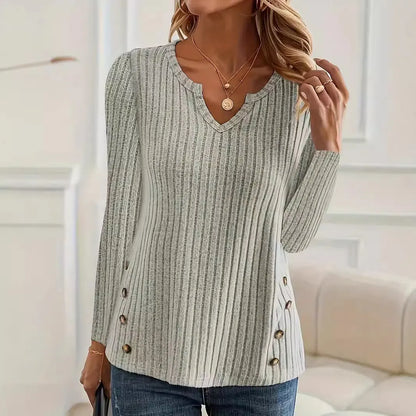 A man's simple solid colour casual knitted sweater with buttons, shown in grey green.