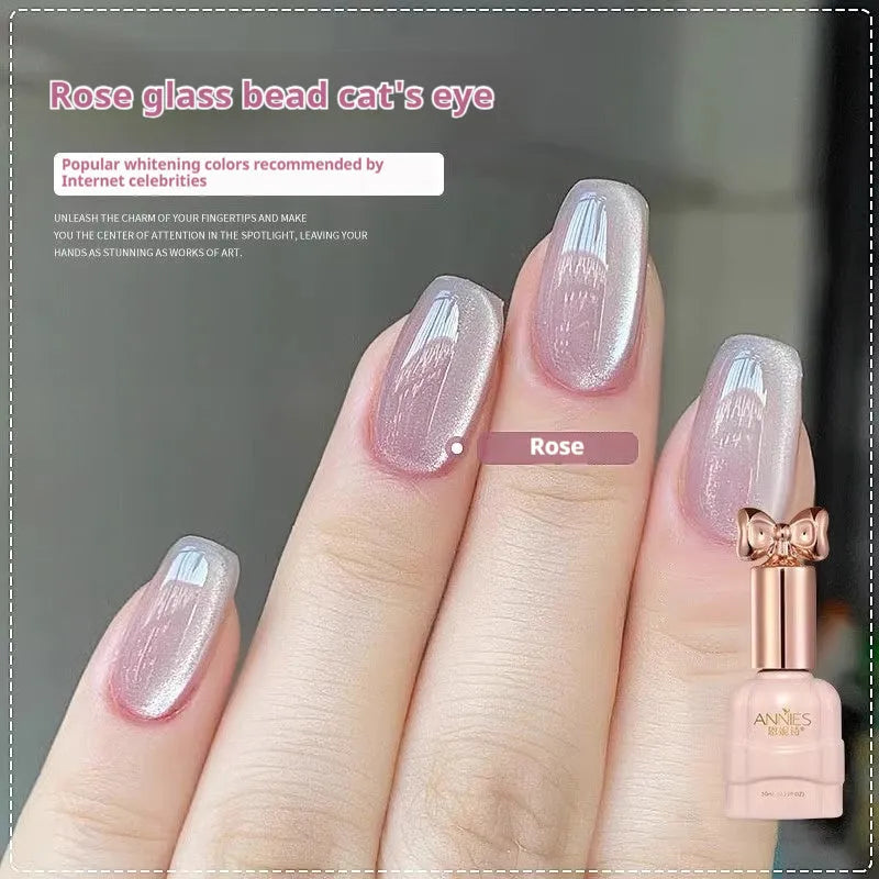 Bottle of micro glass bead cat's eye gel nail polish for magnetic nail art.