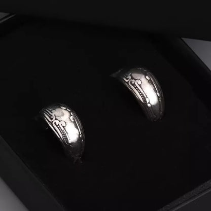 Vintage carved pattern earrings in silver alloy with geometric design