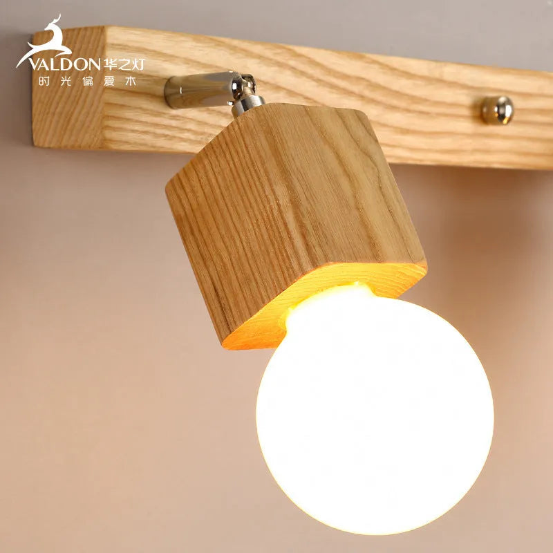 Circular mirror-finish LED wall lamp with 24cm diameter showing three light colour options