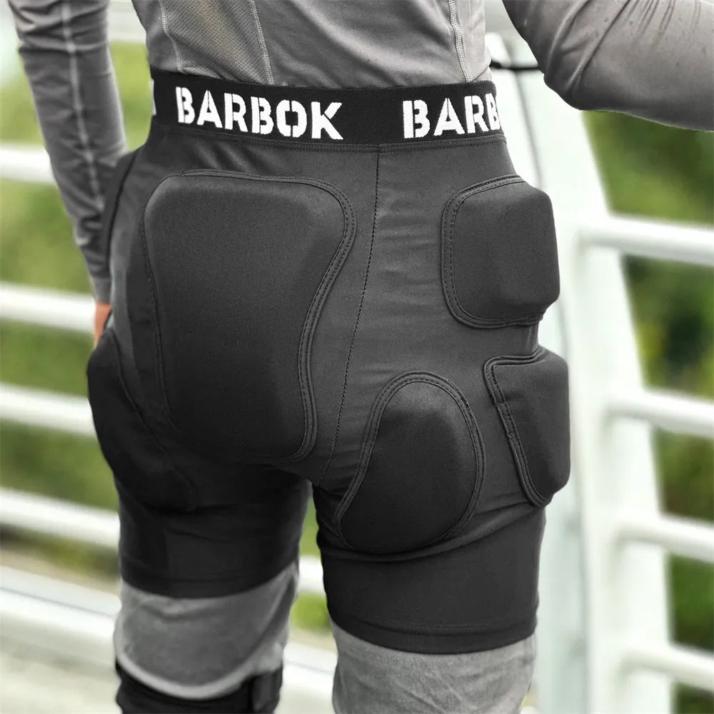 Black roller skating hip pad pants with NBR foam protection panels for skateboarding