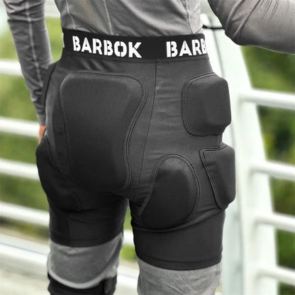 Black roller skating hip pad pants with NBR foam protection panels for skateboarding
