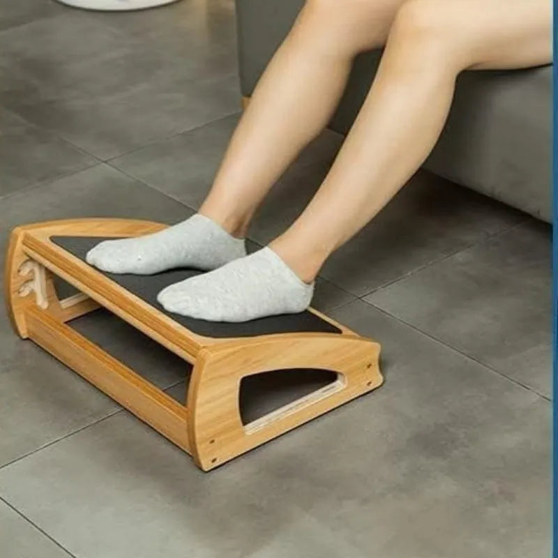 Wooden adjustable bamboo office desk footstool in natural wood colour with modern minimalist design