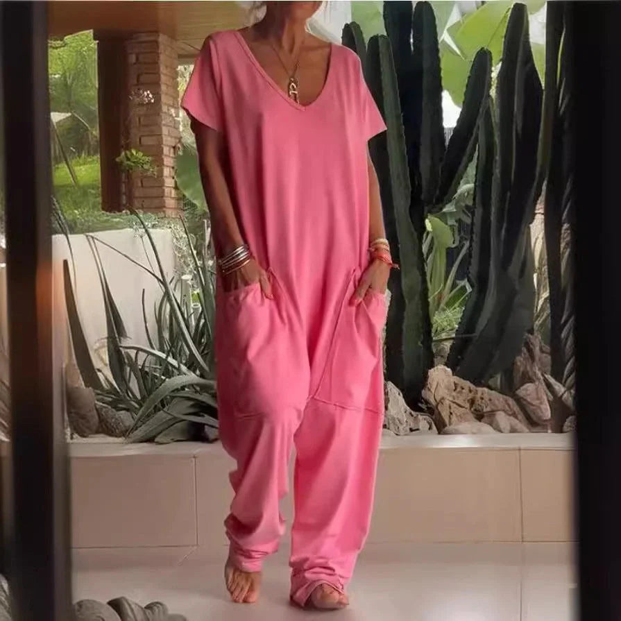 A stylish and comfortable oversized jumpsuit with roomy pockets, available in a variety of vibrant colors.