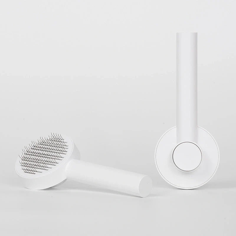 Self-cleaning pet grooming brush for dogs and cats with one-touch cleaning button