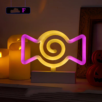 Set of nine glowing Halloween pumpkin lanterns in varying sizes from 14.5cm to 23cm height with plastic construction