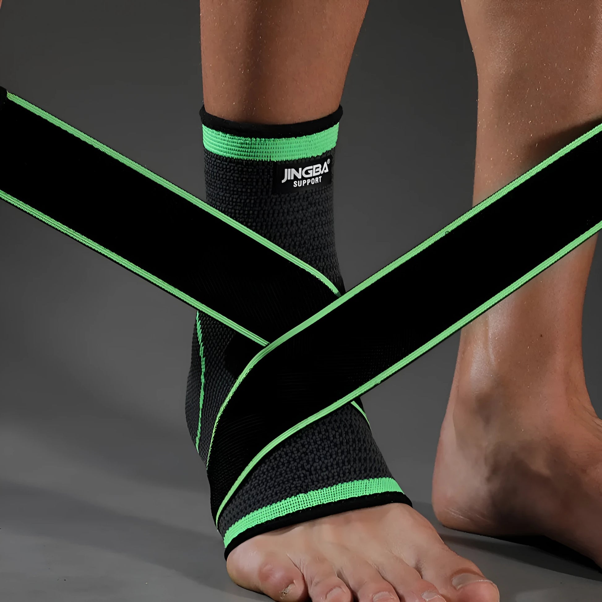 A black sports ankle support brace shown on an ankle, suitable for running and basketball.