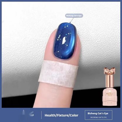 Bottle of micro glass bead cat's eye gel nail polish for magnetic nail art.