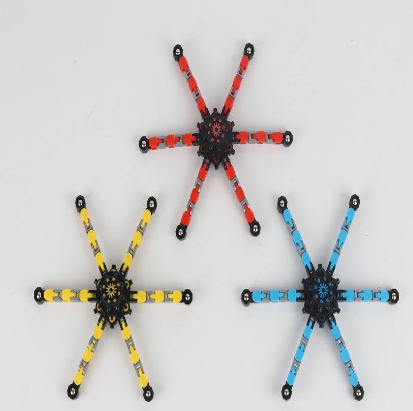 Transformable fidget spinner chain toy in various colors, including blue, red, and yellow, with a suction cup for hands-free spinning